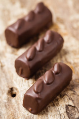 Luxury handmade chocolate  bonbons on wooden background