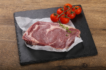 Raw ribeye steak