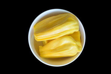 Jackfruit in a white bowl on black background