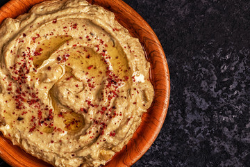 Classic hummus  on the plate.