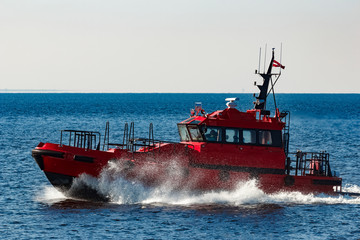 Red pilot boat