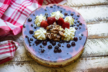 Curd cake with jelly and berries