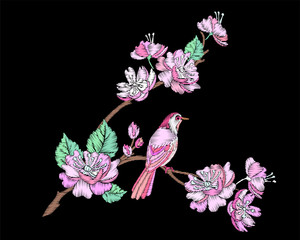 Naklejka premium Embroidery branch of flowers of Japanese sakura and pink bird.