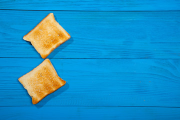 Toast on a wooden blue background