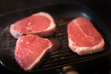 Beef steak fried in pan