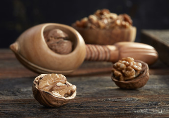 Walnuts and nutcracker close-up