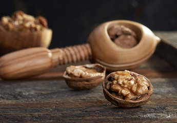 Walnuts and nutcracker close-up