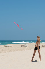 Fototapeta na wymiar Frisbee on a beach