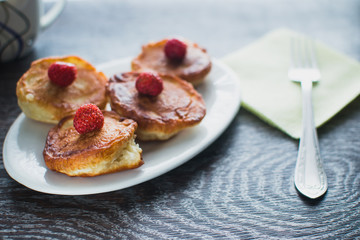 Homemade pancakes on irelke in front of the window