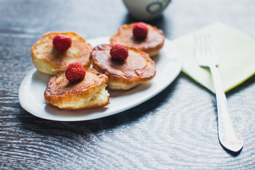 Homemade pancakes on irelke in front of the window