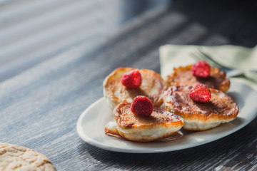 Homemade pancakes on irelke in front of the window