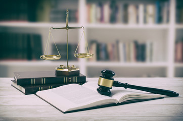 Justice concept on wooden background