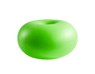 Green donut gym ball for fitness and rehabilitation isolated on white background