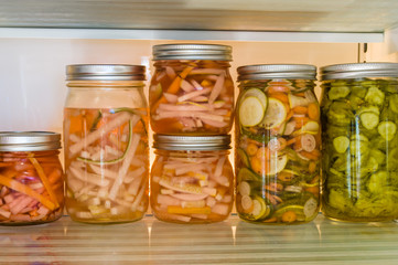 Sliced vegetables being pickled