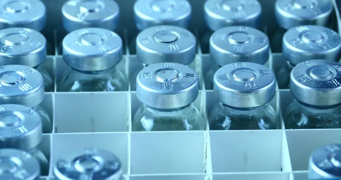 4k Add injection bottle from box.medical health hospital equipment & drug vial.