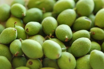 Unripe green walnut fruit