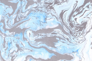 Suminagashi marble texture hand painted with blue ink. Digital paper. Adorable liquid abstract background.