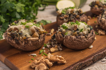 Mushroom caps stuffed with vegetables and cheese