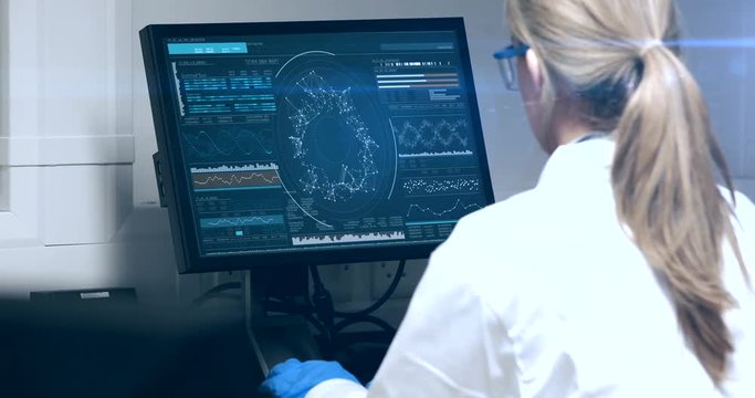 Doctor looking dna molecule on computer