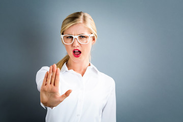 Young woman making a rejection pose