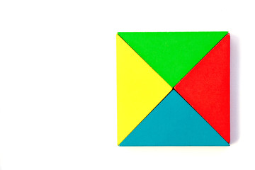 Wooden colorful toy block in triangle shape build to square design on white background