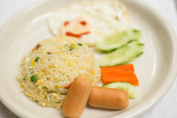 Breakfast meals such as fried rice, fried egg, boiled rice.