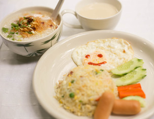 Breakfast meals such as fried rice, fried egg, boiled rice.