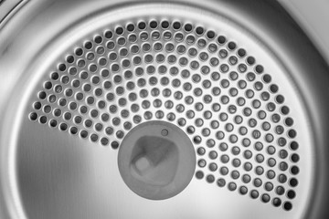 detail of metal inside clothes dryers