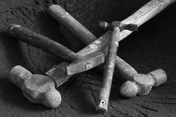 Various of old fashioned hammers in black and white image
