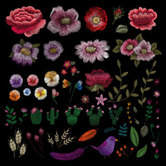Naklejka premium Traditional folk flower fashionable embroidery on the black background. Bouquet of dog rose for printing on clothes. vector