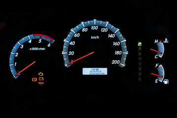 Dashboard bike display digital indicator, black background.