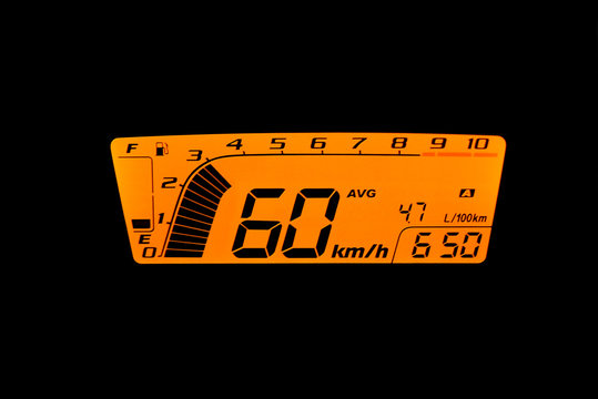 Dashboard bike display digital indicator, black background.