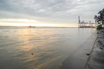 Obraz premium Sunset at tourist spot in Klang, Malaysia. Low light,vibrant colour and noise.