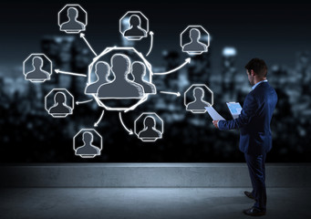 Businessman watching social network sketch on a rooftop 3D rendering