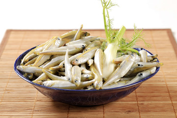 Bowl of fresh anchovies