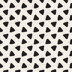Hand drawn style ethnic seamless pattern. Abstract geometric tiling background in black and white. Vector freehand doodle texture.