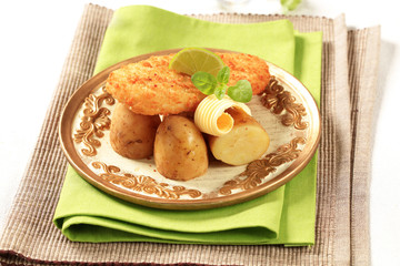 Fried fish fillet with new potatoes