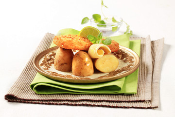 Fried fish fillet with new potatoes