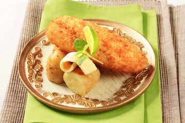 Fried fish fillet with new potatoes