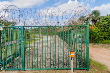 Security fence at Centre Spatial Guyanais (Guiana Space Centre) in Kourou, French Guiana