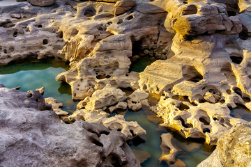 Natural sandstone group Eroded through time for thousands of years. Ubon Ratchathani, Thailand.