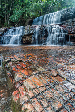 Qubrada de Jaspe (Jasper Creek) is the river and a series of cascades in National Park Canaima, Venezuela. The water flows over a bedrock of jasper.