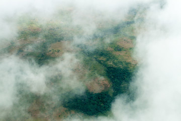 Aerial view of ladscape in Venezuela through clouds