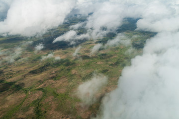 Aerial view of ladscape in Venezuela through clouds