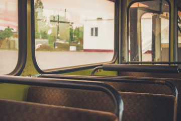 Old time bus cabin with old leather seats