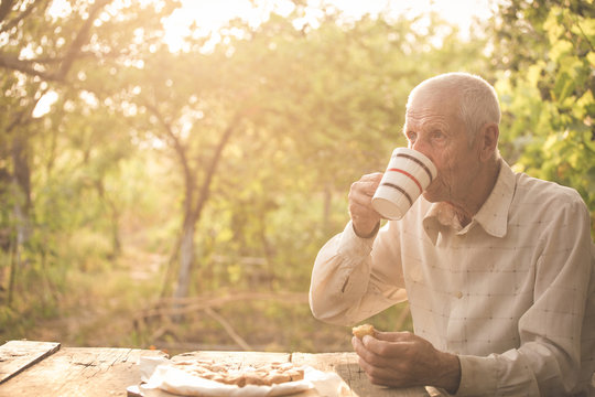 Senior Man Drinking A Tea