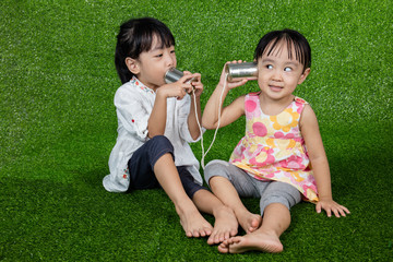 Asian Chinese Kids Playing with Tin Can Phone