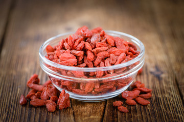 Goji Berries (dried) on vintage wooden background