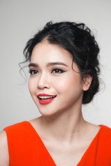 Fashion portrait of asian woman with elegant hairstyle. Perfect makeup.