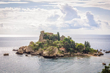 Isola Bella, also known as The Pearl of the Ionian Sea, is a small nature reserve island in a bay - Taormina, Sicily, Italy